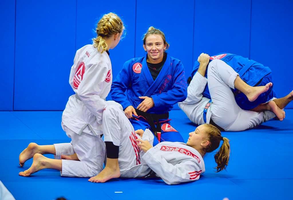 Gracie Barra instructors coaching kids in the GBK program